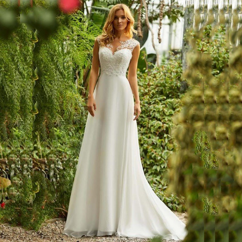 New Cap Sleeve Lace V-Neck Wedding Gown with Chapel Train: Timeless Elegance for Modern Brides